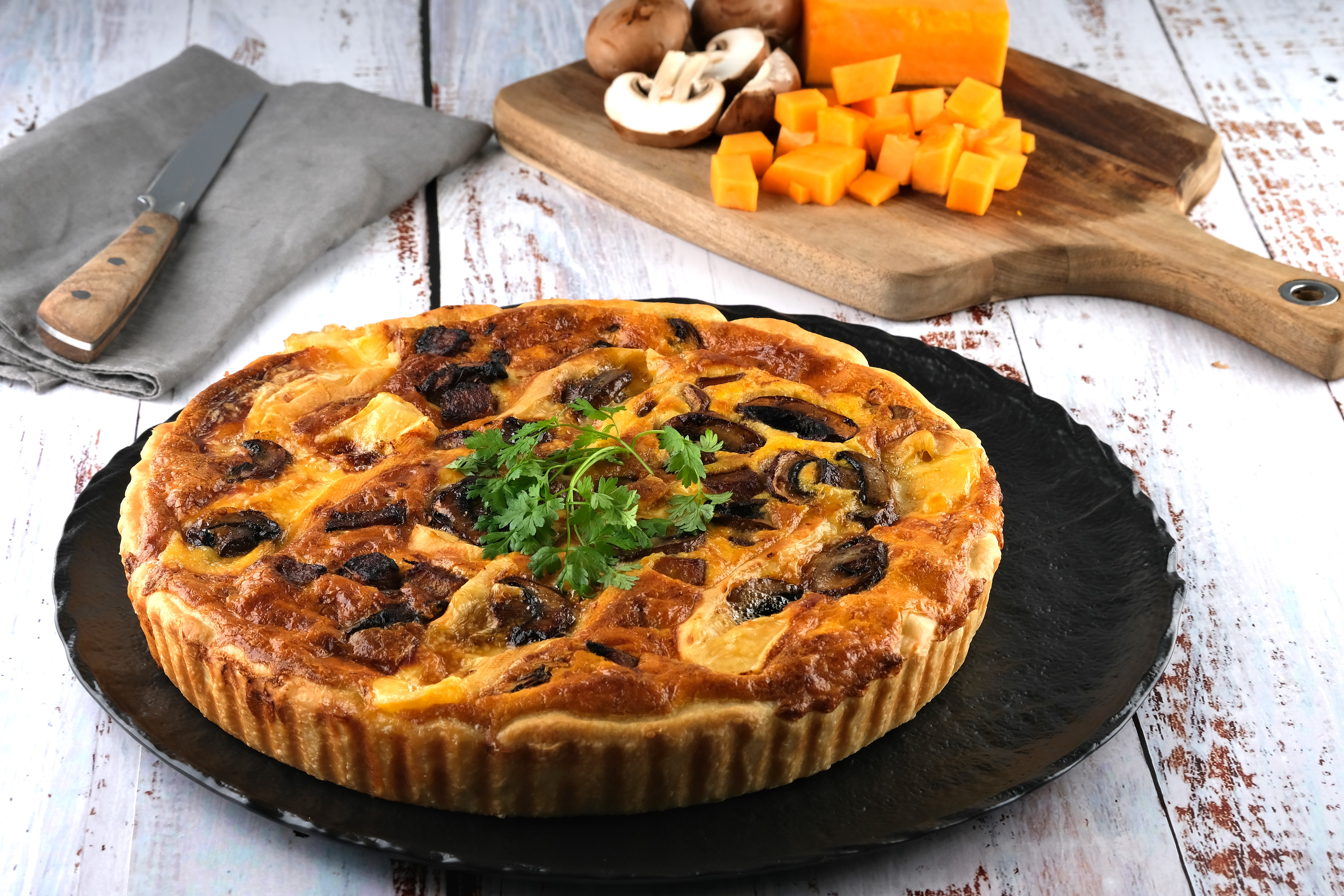 Quiche au butternut, champignons et lardons