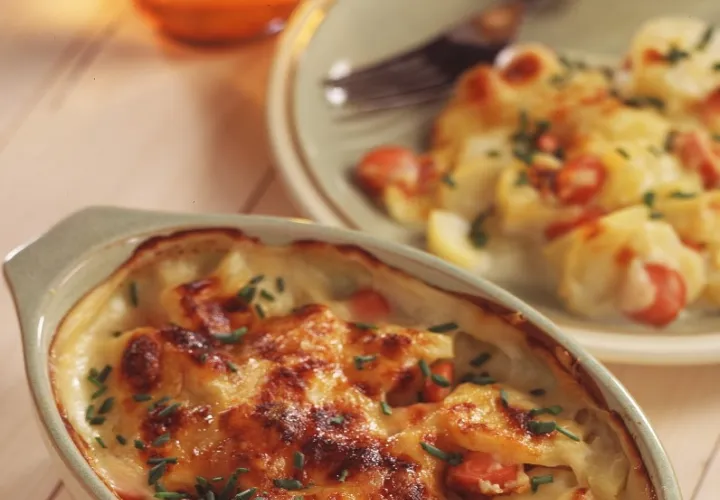 Recette Gratin de pommes de terre aux knacki | Herta